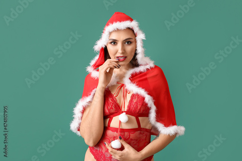 Seductive woman in red sant...