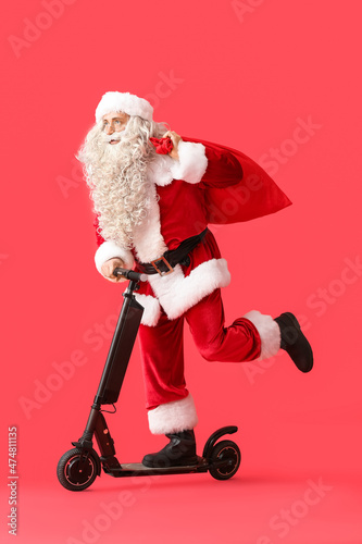 Santa Claus with bag and el...