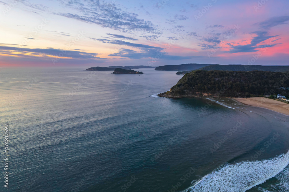 Sunrise seascape with a mix of high and medium clouds