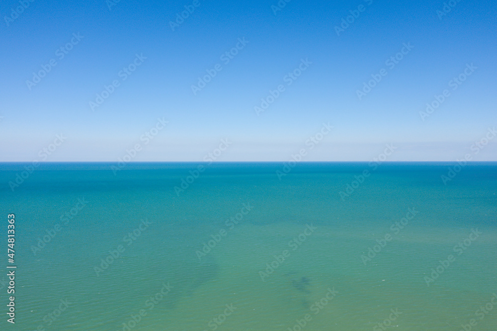 The beautiful Channel Sea in Europe, France, Normandy, towards Ouistreham, in summer, on a sunny day.