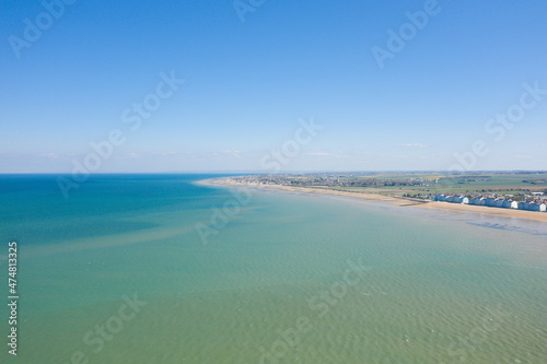 Juno beach in Courseulles sur Mer in Europe, France, Normandy, Arromanches les Bains, in summer, on a sunny day. © Florent