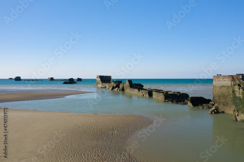 The artificial port of Gold beach in Asnelles in Europe  France  Normandy  Arromanches les Bains  in summer  on a sunny day.
