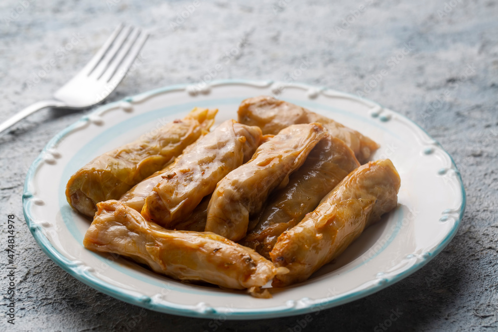 Lahana Sarma, Turkish traditional food,a boiled cabbage leaf that is formed into a roll with a stuffing of rice Lahana Sarma, Turkish traditional food,a boiled cabbage leaf that is formed into a roll with a stuffing of rice