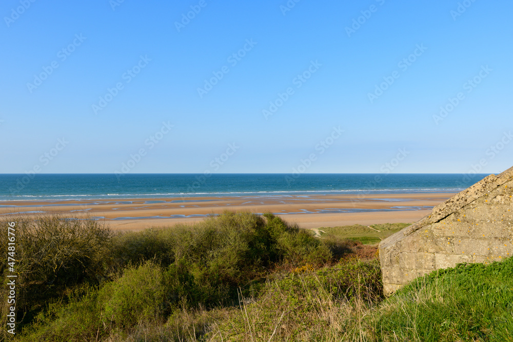 The WN62 bunker above Omaha beach in Europe, France, Normandy, towards Arromanches, Colleville, in spring, on a sunny day.