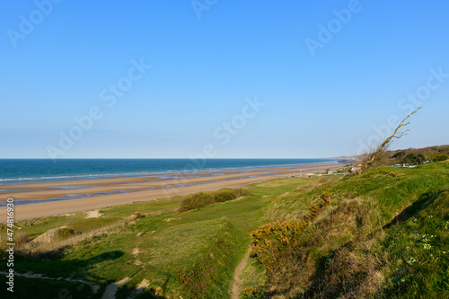 Omaha beach seen from steep cliffs in Europe  France  Normandy  towards Arromanches  Colleville  in spring  on a sunny day.