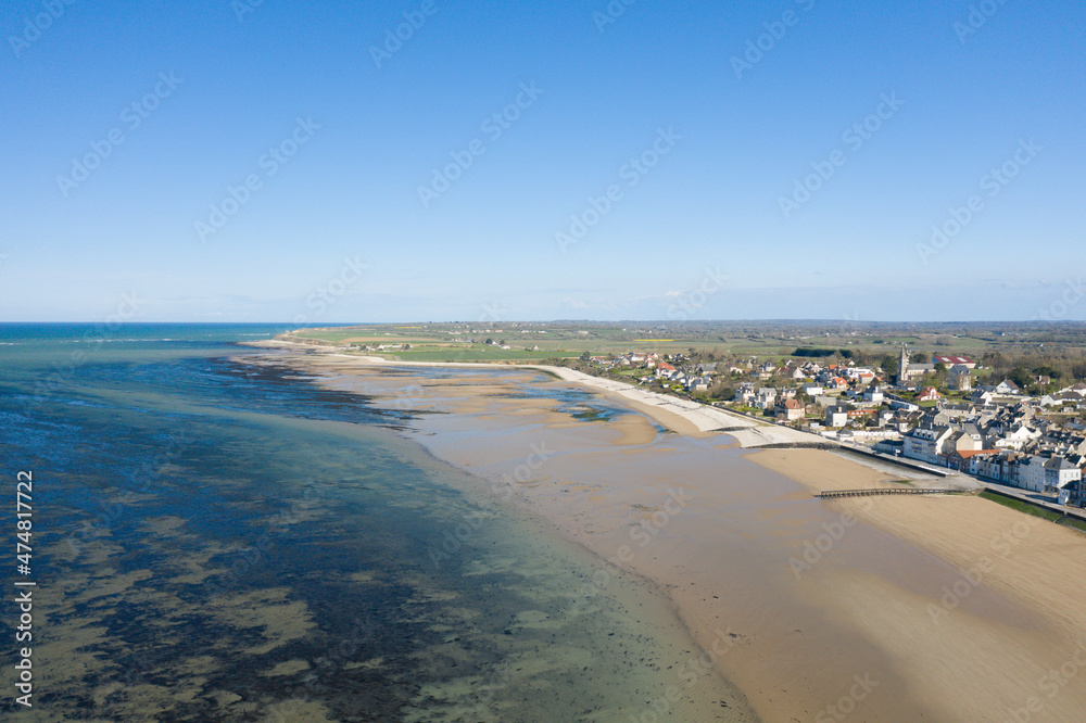 The huge city beach of Grandcamp-Maisy in Europe, France, Normandy, towards Omaha beach, in spring, on a sunny day.