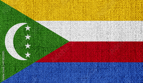 Comoros flag on knitted fabric photo