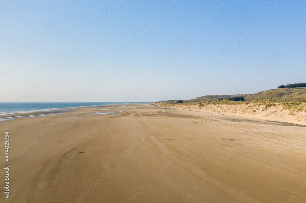 The sandy beach of La Vieille Eglise in Europe, France, Normandy, Manche, in spring, on a sunny day.
