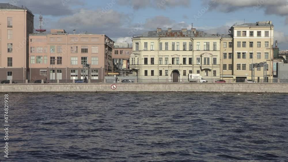 Neva river embankment in St. Petersburg on a sunny summer day Neva river embankment in St. Petersburg on a sunny summer day