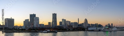 Panoramic view of Yokohama Minato Mirai 21 seaside urban area in central Yokohama with Landmark tower at Magic hour.