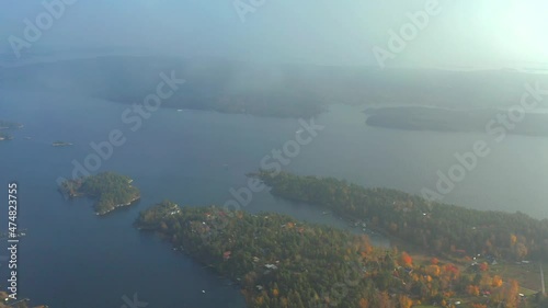 Foggy and misty archipelago aerial view near Djurö baltic sea in Stockholm Europe photo