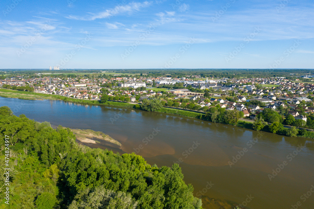 The town of Sully sur Loire on the banks of the Loire in Europe, in France, in the Center region, in the Loiret, in summer, on a sunny day.