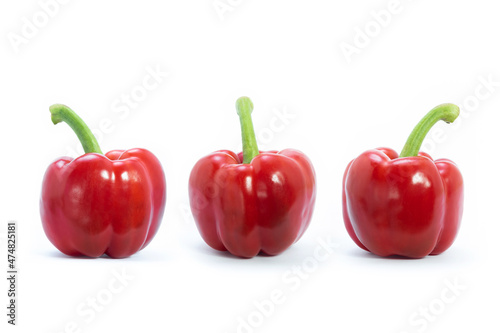 Set of bell pepers is red on white background. Organic vegetables.