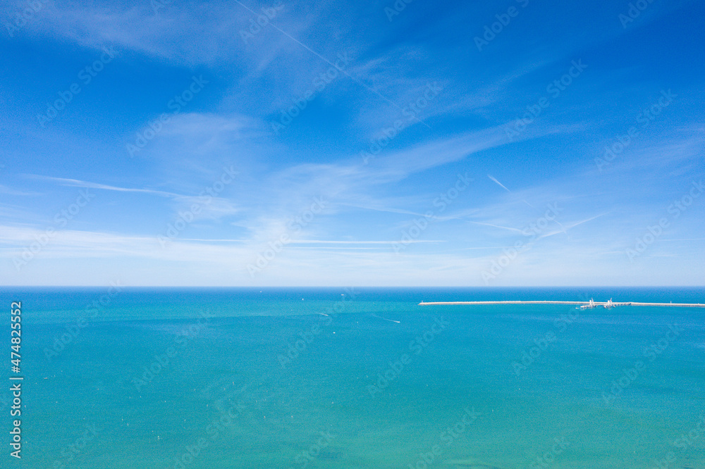 The Channel Sea and its turquoise colors in Europe, France, Normandy, towards Etretat, in summer, on a sunny day.