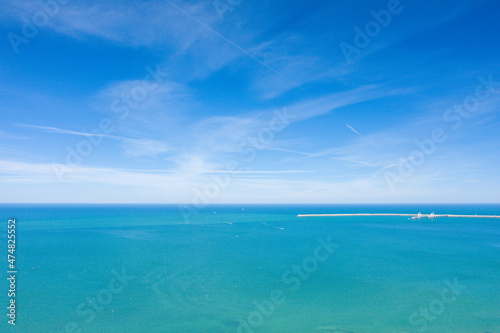 The Channel Sea and its turquoise colors in Europe, France, Normandy, towards Etretat, in summer, on a sunny day.
