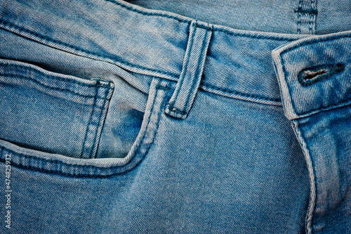 Textured blue denim texture stitched with a button-up texture.