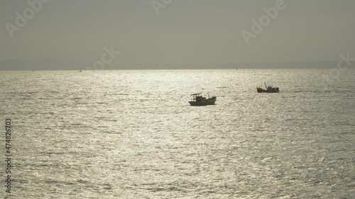 Wallpaper Mural Small Vietnamese fishing boats in open ocean water, Mui Ne Peninsula Torontodigital.ca
