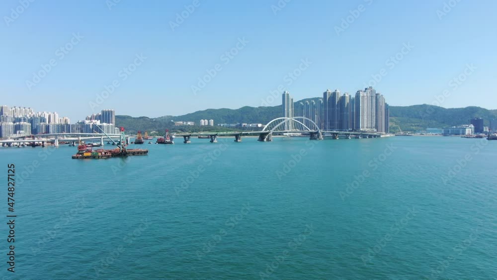 Hong Kong cross bay link construction project, a dual two-lane bridge connecting Tseung Kwan O Lam Tin Tunnel to Wan Po Road, Aerial view. Hong Kong cross bay link construction project, a dual two-lane bridge connecting Tseung Kwan O Lam Tin Tunnel to Wan Po Road, Aerial view.