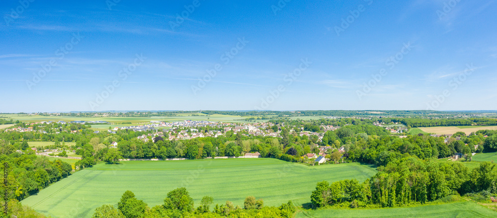 The panoramic view over the city of Ranville in Europe, in France, in Normandy, towards Caen, in Ranville, in summer, on a sunny day.