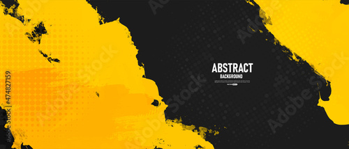 Abstract black and yellow grunge texture background with halftone effect vector. 