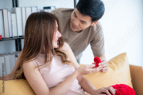 young Asian couple in conce...