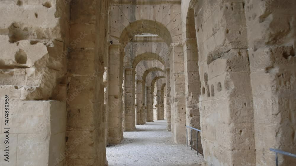 Walking Through Passage Of Ancient Amphitheater In El Jem, Tunisia. Tracking Walking Through Passage Of Ancient Amphitheater In El Jem, Tunisia. Tracking