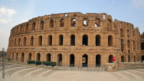 Exterior View Of Old Oval Amphitheatre Of El Jem In Tunisia. Pan Right photo