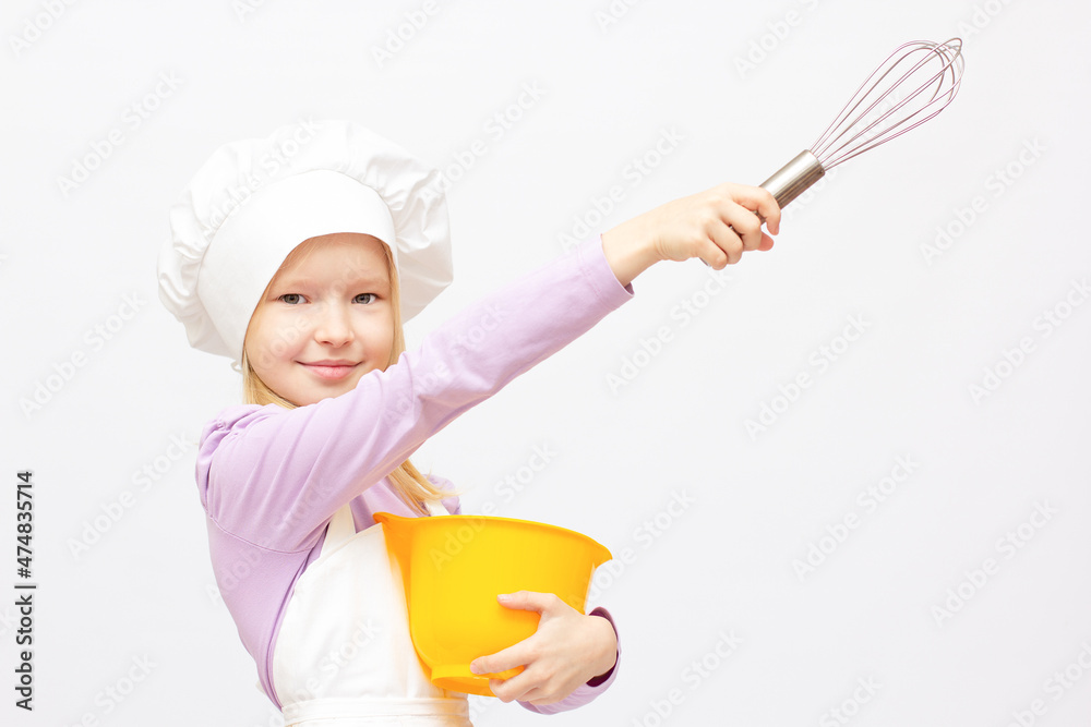 Beautiful little girl in chef uniform isolated on white Beautiful little girl in chef uniform isolated on white
