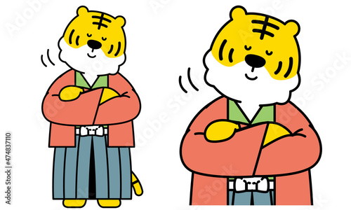 腕を組んで頷いている着物を着たトラさんのイラスト素材。