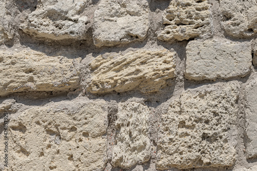 Part of the old wall.. Stone wall as background or texture.