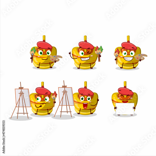 Artistic Artist of yellow sugar candy cartoon character painting with a brush