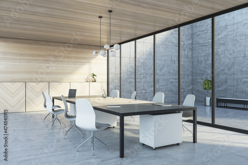 Modern wooden and concrete meeting room interior with panoramic glass windows, table with devices. 3D Rendering.