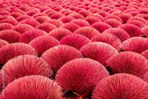 Bamboo sticks being dried outdoor to be made into incense sticks in Quang Phu Cau Village, the outskirts of Hanoi, Vietnam