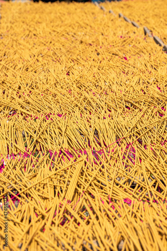 Incense sticks being dried outdoor in Quang Phu Cau Village, the outskirts of Hanoi, Vietnam
