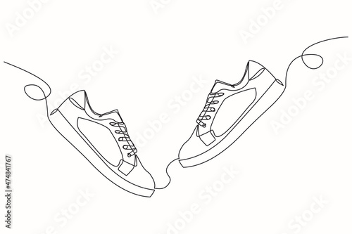 Continuous line drawing of casual sneakers shoes. Single one line art of sport shoes. Vector illustration