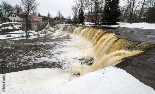 Partly frozen Keila-Joa waterfall in winter photo