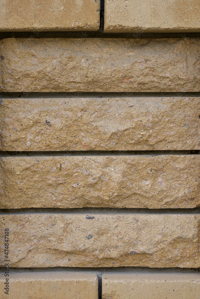 brick wall close up. wall of light bricks. photo can be used as photo background brick wall close up. wall of light bricks. photo can be used as photo background