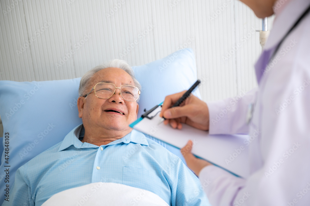 Fototapeta premium elderly patient old man in concept of health insurance, visit professional doctor at hospital