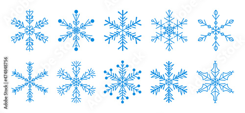 Set of blue snowflakes isolated on white. Design elements for Christmas and New Year greeting cards. Simple modern vector illustration