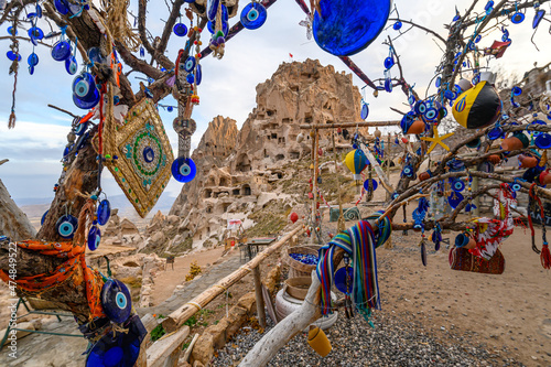 Uchisar Castle, town in Cappadocia, Turkey near Goreme. Cappadocia landscape and valley with ancient rock formation and caves. 