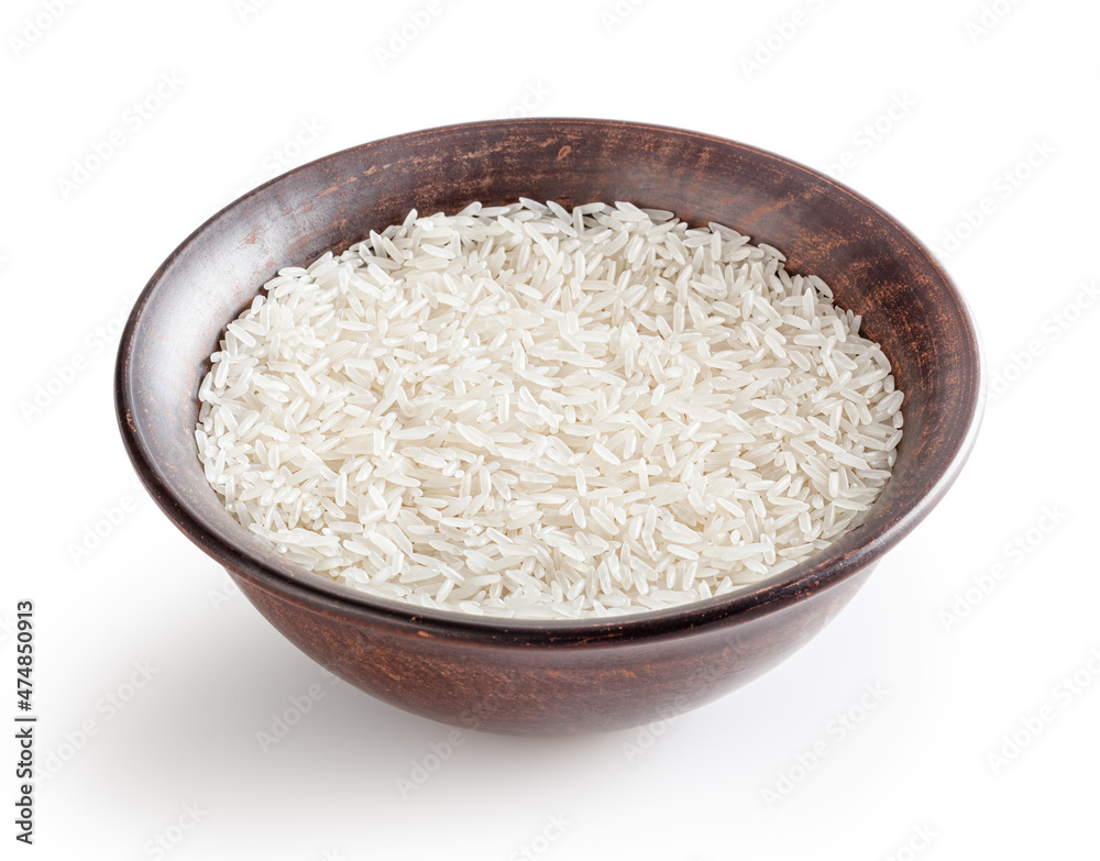 Uncooked jasmine rice in ceramic bowl isolated on white background with clipping path Uncooked jasmine rice in ceramic bowl isolated on white background with clipping path