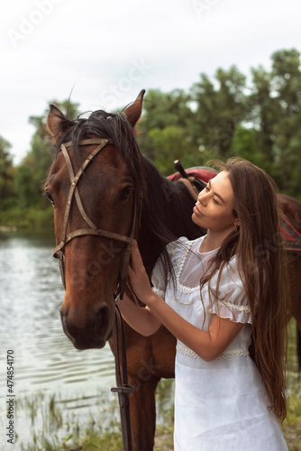 Walk with a horse near the river