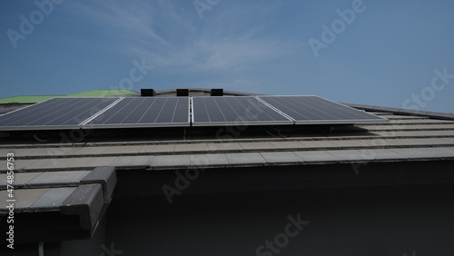 Photovoltaic. Solarcell panel. Solar roof power plant on the roof of a residential building. photo voltaic panels on house roof. Photovoltaic roof. Solar Energy concept. sustainable and clean power.