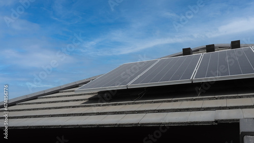 Photovoltaic. Solarcell panel. Solar roof power plant on the roof of a residential building. photo voltaic panels on house roof. Photovoltaic roof. Solar Energy concept. sustainable and clean power.