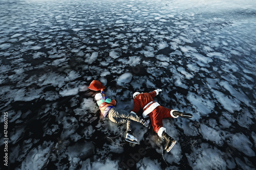 guy takes gifts from santa claus, skates on the ice of the lake, rob santa