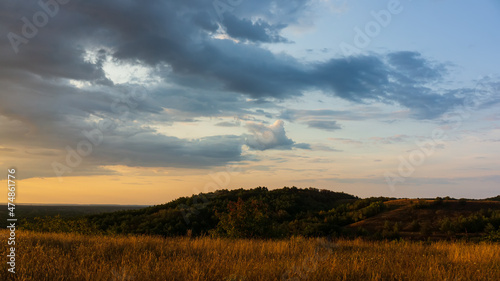 Clouds and hills in the evening, countryside.