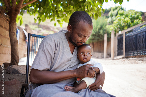 Father hold his child in hands