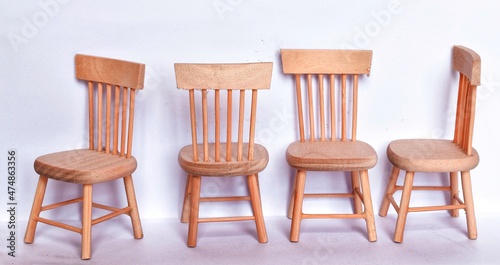 set of wooden chairs isolated on white background