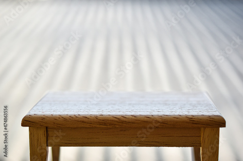 Empty wooden table blur abstract background for product product placement