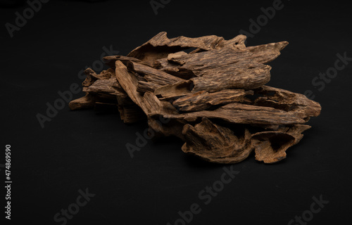 Close UpShot Of Sticks Of Oudh On Black Background 